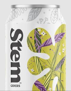 a can of soda with leaves and flowers on the side, in front of a gray background