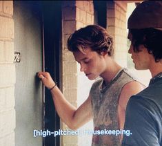 two young men standing next to each other in front of a brick wall with the words high - pitched house keeping written on it