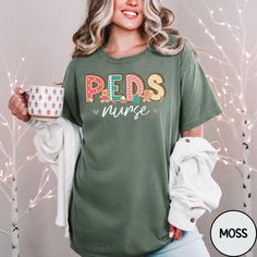 Celebrate the holidays in cozy style with our Pediatric Nurse Christmas Sweatshirt, perfect for dedicated peds and PICU nurses. This festive and comfortable sweatshirt is ideal for baby nurses who want to show off their love for pediatric care during the holiday season. Whether you're gifting it or wearing it yourself, this pediatric nurse shirt is a fun and thoughtful way to spread Christmas cheer at work or home! Comfort Colors 1717 Brand Shirt ▶Unisex Adult Sizing ▶See Our Size Chart for Prop Pediatric Care, Picu Nurse, Nursing Baby, Nurse Christmas, Pediatric Nursing, Branded Shirts, Nursing Shirts, Cozy Fashion, Pediatrics