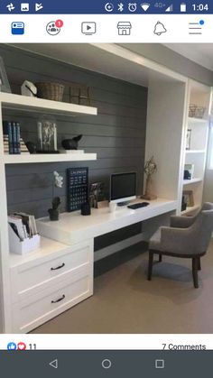 a home office area with desk, chair and bookshelf on the wall behind it