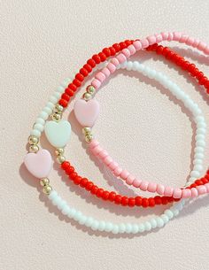 This simple yet beautiful Be My Valentine Bracelet comes in 4 different colors. Red, White, Pink, and Blush Pink. They're are made with high quality seed beads and 14k gold filled spacers, that will NOT fade nor tarnish. This listing is for ONE bracelet. Valentine’s Bracelets, Valentine Beaded Bracelets Diy, Valentines Day Beaded Bracelets, Valentine’s Day Jewelry, Valentines Bracelets Diy, Valentine’s Day Bracelet Ideas, Claybead Bracelet, Valentines Day Bracelet, Body Jewelry Diy