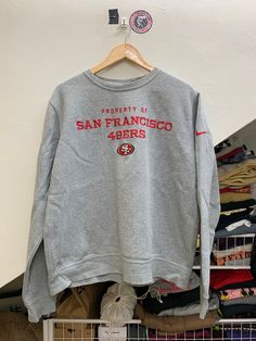 📌 BUY MORE AND SAVE MORE!! ADDITIONAL EACH ITEM $5 FOR  SHIPPING* Hi All!! May our beloved customer have a great day😁 ✅ I Just go back from thrift and found A vintage sweatshirt NFL SAN FRANCISCO TRAINING  L grey.  😻 ✅PLEASE READ THE DESCRIPTION BELOW BEFORE PURCHASING. ✅ pit 25 inch X length 27 inch length... a great vintage SF 49ers NFL sweatshirt ✅RARE AND FAST SELLING ITEm! ✅Payment Method & Shipping - Item will be ship along with Tracking Number after received a complete payment. Using F Long Sleeve Fleece Top With Team Logo, Fall Season Team Logo Sweatshirt, Varsity Crew Sweatshirt With Logo Print, Collegiate Crew Sweatshirt With Logo Print, Team Spirit Logo Print Sweatshirt For Game Day, Team Spirit Sweatshirt With Logo Print For Game Day, Sportswear Hoodie Crew Neck For Sports Season, Collegiate Crew Neck Hoodie For Sports, Sportswear Sweatshirt With Team Logo