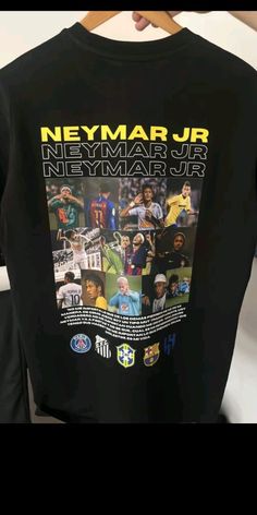 a black t - shirt with many different pictures on the front and back of it