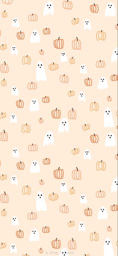 an orange and white halloween pattern with cats, pumpkins, and ghost faces on it