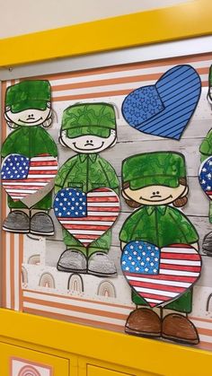 an american flag and soldier themed bulletin board