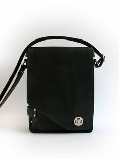 This bag has a separate padded protective compartment, designed especially for 12.9-inch iPad Pro or the latest 13.3-inch MacBook Pro. It is also large enough to carry A4 size document folder, another laptop of similar dimensions or iPad in a protective sleeve and it's accessories in the main compartment, books and everything else you need in everyday life. Made of 2 mm thick matt black cowhide, lined with black/white stripe cotton fabric. Leather straps are underlaid with cotton belt. That way Black Crossbody Laptop Bag With Sleeve, Black Rectangular Satchel With Laptop Sleeve, Black Satchel With Laptop Sleeve For Everyday Use, Modern Everyday Laptop Bag, Black Modern Satchel For Everyday, Modern Black Satchel For Everyday, Black Satchel With Laptop Sleeve For On-the-go, Modern Black Satchel With Laptop Sleeve, Black Briefcase With Laptop Sleeve For On-the-go