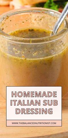 homemade italian sub dressing in a jar with a spoon