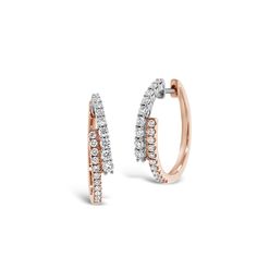 These sleek crossover earrings are a modern take on the classic diamond hoop. They’re an ideal way to add a sophisticated edge to any ensemble. -18K gold weighing 4.57 grams -40 round diamonds totaling 0.57 carats Available in yellow, white, and rose gold. Please allow 4-6 weeks for delivery if item is not in stock. Item no. E10399 Rose Gold Hoop Earrings, Diamond Earrings Design, Diamond Signet Ring, Elephant Pendant Necklace, Diamond Heart Pendant Necklace, Diamond Jewelry Designs, Heart Pendant Diamond, Diamond Hoop Earrings, Fine Jewellery Earrings