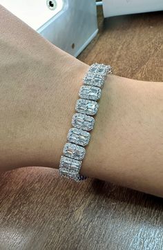 6.06 Carat Natural Diamond Bracelet F-G VS-SI 14K White Gold 100% Natural Diamonds, Not Enhanced in any way 6.06CT F-G VS-SI 14K White Gold, prong style, 15.72 grams 7 inches in length 9 mm in width, 3 mm in height B6065W ALL OUR ITEMS ARE AVAILABLE TO BE ORDERED IN 14K WHITE, ROSE OR YELLOW GOLD UPON REQUEST. All Chains of Pendants and Necklaces Can be Requested in 16'' or 18'' Length. . This item is proudly handcrafted in the USA. Perfect gift on any occasion. This Item has passed highest qual Luxury Silver Rectangular Tennis Bracelet, Anniversary White Gold Rectangular Bracelet, White Gold Rectangular Tennis Bracelet For Anniversary, Formal White Gold Tennis Bracelet With Rectangular Shape, Formal White Gold Rectangular Tennis Bracelet, Silver Baguette Diamond Tennis Bracelet, Aaa Quality Silver Bracelet For Wedding, Rectangular White Gold Jubilee Tennis Bracelet, Aaa Quality Silver Baguette Cut Jewelry