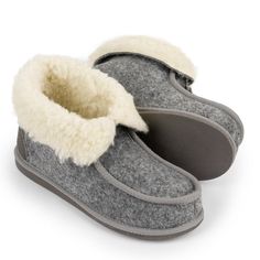 Introducing our women's grey felt wool slipper boots – the ultimate blend of comfort, style, and lightness. Crafted from premium woolen fabric, these insulated slippers envelop your feet in warmth without adding weight. The unique adjustable top design ensures a personalised fit. Enhance your relaxation with these high-quality, cozy, and lightweight slipper boots, designed exclusively for women. Featuring a durable rubber sole and a modern grey aesthetic, these slippers are perfect for everyday Felt Wool Slipper, Embroidered Slippers, Brown Slippers, Presents For Mum, Men's Slippers, Sheepskin Slippers, Felt Wool, Felted Slippers, Wool Slippers