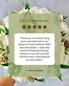 a bouquet with white flowers and greenery in front of a card that says testimonal