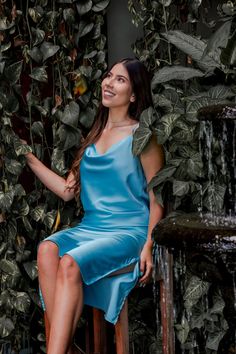 Elevate your sleepwear with this stunning Blue Draped Silk Slip PJ. Made from luxurious Italian silk fabric, this slip features a gorgeous cowl neck that highlights the bust and adjustable shoulder straps for a perfect fit. The subtle loose silhouette and slits on both sides add a touch of elegance and femininity. Soft and comfortable, the fabric moves with you, ensuring a peaceful night's sleep. Perfect for a special occasion or just to treat yourself to something luxurious. Find more at: www.l Lingerie Gown, Blue Drapes, Long Drapes, Womens Pajamas, Silk Slip, Pajamas Women, Silk Fabric, Cowl Neck, Shoulder Straps