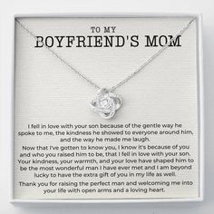 a necklace with the words to my boyfriend's mom on it in a box