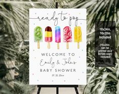 a welcome sign for a baby shower with popsicles and ice cream on it