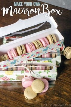 macaroon box with macaroons in it sitting on a table