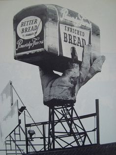 an advertisement for bread on top of a building