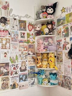 there are many different stuffed animals on the shelves in this room with pictures all over the wall