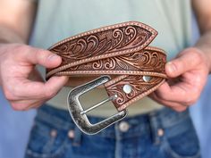 LENGTH - 1-1/2" Wide (38 millimeters wide) FIT - With a 5" room for adjustability, you'll be able to cinch your handmade leather belt as tight as you please. Our country western belt is available in sizes 28"-46". For the right fit, pick your belt at 2" longer than your waist size. (Example, if you wear a size 36 pants, you should order a size 38 belt) FULL GRAIN LEATHER IN ONE-PIECE - (Selected Genuine Grade Leather). Our cowboy inspired belt is made from only quality full grain leather, each w Mens Western Belt Buckles, Mens Leather Belts, Cowboy Accessories, Cowboy Buckle, Leather Tool Belt, Cowboy Belt Buckles, Custom Leather Belts, Cowgirl Belts, Handmade Belt