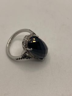 Vintage black onyx champaign diamond ring 925 sterling silver size 7 Set with a tiny row of pink sapphires Sterling Filigree Setting Handmade Size 9 can be re sized for you. My jeweler charges a $10-$20 fee Sterling Silver is rhodium finished to prevent tarnish All rings are shipped in a nice gift box. Check out our over a THOUSAND great reviews!!! Engraving is $4 per letter and is not always perfect depending on the piece. It can take a few days if the jeweler is busy. This is payable to Paypal Judithsltd@gmail.com Mermaid Ring, Pink Sapphire, 925 Sterling Silver Ring, Black Onyx, Silver Fashion, Vintage Black, Onyx, Diamond Ring, Gemstone Rings