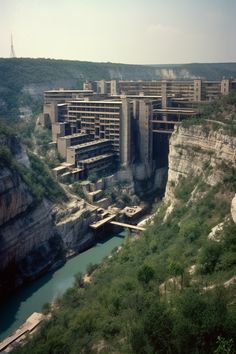 a large building built into the side of a cliff