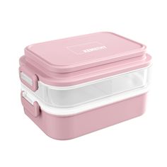 a pink and white lunch box on a white background