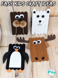 four popsicle craft kits with penguins, polar bear and penguin on the sticks for kids to make