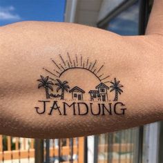 a man's arm with a tattoo that reads jambung on the side