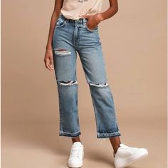 The Free People Lita Light Wash Distressed High Waisted Jeans Are Here To Save Your Denim Collection From Boredom! These Ultra-Cool Jeans (In Free People's Yosemite Blue Wash) Are Formed By Sturdy Denim That Creates A Trendy High-Waisted Fit, A Five Pocket Cut And Belt Loops, And A Branded Top Button/Hidden Zip Fly. Straight Legs Have Lived-In Fading And Distressing Throughout Before Ending At Raw Hems With Side Notches. Unlined. 60% Cotton, 40% Lyocell. Size: 26 Nwt, No Flaws Or Issues. 36” Wai Ripped Cropped Denim Bottoms, Blue Cropped Bottoms With Frayed Hem, Cropped Blue Bottoms With Frayed Hem, Casual Cropped Dark Wash Bottoms, Light Wash Stretch Cropped Bottoms, Casual Blue Cropped Bottoms, Low Rise Boyfriend Jeans, Faded Black Jeans, White Distressed Jeans