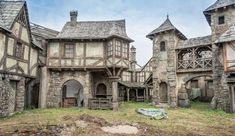 an old building with stone and wood trimmings