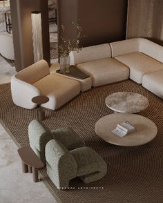 a living room filled with lots of furniture and decor on top of a brown rug