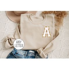 Chenille Patch Initial Sweatshirt, Personalized Sweatshirt for Women, Monogrammed Shirt Varsity Letter Shop with Confidence! We are a 5-Star Rated Shop operating since 2015! Price is Per Shirt- here's how to order: 1. Select your shirt design, color & size in the drop down menu. 2. Click Add to Cart, then go back and repeat for each shirt. SIZING: * Tees and Sweatshirts are Unisex, classic fit. Please refer to size chart in listing photos for details. * Easy measuring tip: Take your favorite shi Gold Crew Neck Sweatshirt For Fall, Gold Long Sleeve Sweatshirt For Fall, Gold Crew Neck T-shirt For Fall, Initial Sweatshirt, Patches Shirt, Model Call, Monogram Shirts, Custom Initials, Embroidered Sweatshirts