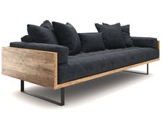 a couch with black cushions and wooden frame