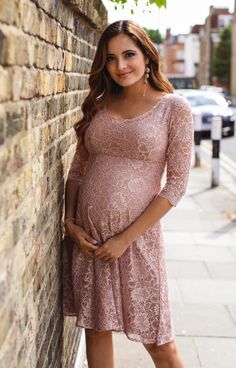 Our best-selling Freya maternity gown is now available in pretty orchid blush. Featuring the same beautiful details as before with a gentle scoop neckline and sheer detail, but in nude blush for a dreamy outfit perfect with a vintage rose sash and a wildflower in your hair. Our feminine and floaty dress in corded lace has a little stretch for extra give when taking to the dance floor and the merest sprinkle of shimmer to catch the light. Perfect for parties and blooming bridesmaids. Elegant Pink Maternity Dress, Pink Fitted Maternity Dress For Wedding, Feminine Lace Maternity Dress, Elegant Pink Maternity Bridesmaid Dress, Feminine Maternity Dress In Pink, Feminine Pink Maternity Dress, Pink Feminine Maternity Dress, Fitted Pink Maternity Bridesmaid Dress, Rose Tiffany