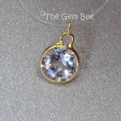 Thank you for coming in! Gorgeous 14k solid Yellow gold bezel station charm pendant! The stones used for the bezels are of true gem quality-flawless, the metal work was done beautifully. One white topaz charm pendant per winning! You'll get 1 charm pendant like the ones in the picture per winning. DIMENSION: 6mm stone diameter (hole size 1mmx0.6mm) MATERIAL: 14k solid Yellow gold, White Topaz Grade of stones: Flawless Eye-clean The loops are quite small for these charms, if you need larger loops please purchase one of these jump rings, links below: https://www.etsy.com/listing/1063226591/4mm-22-gauge-14k-solid-yellow-gold-open?click_key=6e61d83ded9e965e5672f26246bbfd89d36cf75e%3A1063226591&click_sum=9f459128&ga_search_query=14k%2Bopen%2Bjump%2Bring&ref=shop_items_search_6&pro=1&sts=1 https White Round Pendant Jewelry With Bezel Setting, White Pendant Jewelry With Bezel Setting, Gold Jewelry With White Topaz Birthstone, Faceted Round Pendant Jewelry For Anniversary, Metal Work, Wow Products, White Topaz, Solid Yellow, Jump Rings