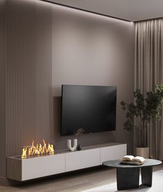 a modern living room with a fireplace and flat screen tv mounted on the wall above it