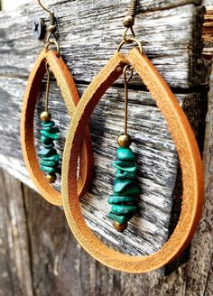 A beautiful drop of natural Malachite dangles inside these large, handmade Latigo leather earrings. Malachite stones are matched by hand to compliment each other in size, shape, and color, making this a striking and unique pair.  Personalize your earrings by selecting leather color and metal options. (Mahogany leather is currently sold out.) Ear wires and metals are nickel-free. Ear wires come in antique brass, silver-tone, or sterling silver. (All metals will match colorwise.) I craft these by Resin Leather Jewelry, Leather Earring Shapes, Small Leather Earrings, Leather Earring Designs, How To Make Leather Earrings, Leather And Bead Earrings, Diy Boho Earrings, Unique Diy Earrings Ideas, Boho Earrings Diy