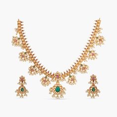 Inspired by popular south Indian gutta pusalu concept.This necklace set is everyones favorite at Tarinika. Premal is antique necklace you'd get moonstruck by its sheer detailing. Take your love for Indian traditional jewelry to the next level with this CZ stone and clustered pearls crafted and antique plated jewel. It will be your all time choice for special Indian occasions. Wear it with any handloom sari or lehengas for perfect Indian look. Details & Specifications: Materials used: CZ stones w Antique Necklace Set, Pearl Crafts, Necklace Set Indian, Buy Jewellery Online, Indian Jewelry Sets, Traditional Earrings, Antique Gold Jewelry, Gold Jewelry Simple, Antique Necklace