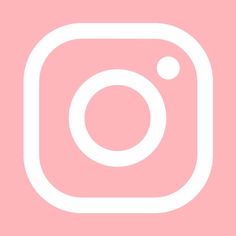 a white instagram icon on a pink background