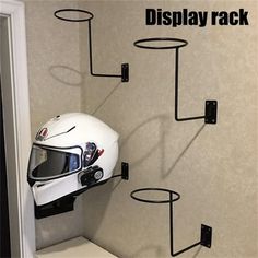 a helmet mounted to the side of a wall