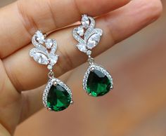 these beautiful earring made of zirconia stone green drop and silver plated ear post . they 1.5 '' long from top to bottom . Emerald Earrings Drop, Emerald Green Earrings, Wedding Earrings Drop, Green Jewelry, Earrings Green, Emerald Earrings, Green Earrings, Bridesmaid Earrings, Third Party