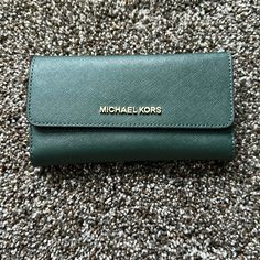 Color Racing Green Trifold Wallet Saffino Leather Compact Green Wallet For Travel, Compact Green Travel Wallet, Elegant Green Wallets For Travel, Bags Michael Kors, Racing Green, Travel Wallet, Michael Kors Wallet, Travel Wallets, Trifold Wallet