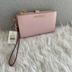 100% Authentic! Price Is Firm Mk Powder Blush Color Double Zipper Wristlet: Gold Tone Hardware Detachable Strap 7-Card Slot 2 Side Slip Pocket 2 Zippered Compartments Inner Phone Holder With Secure Button 1 Large Bill Slot 7.25" W X 4.5" H X 1" D Blush Bag With Card Slots, Clutch Wristlet With Zipper Closure, Pink Zipper Closure Wristlet For Everyday Use, Everyday Pink Wristlet With Zipper, Michael Kors Keychain, Micheal Kors Wallet, Silver Wallet, Mk Wallet, Michael Kors Wristlet