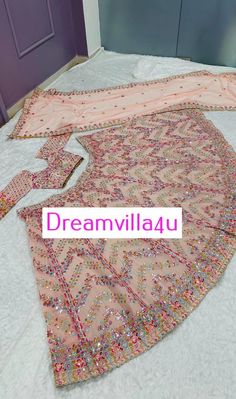 Fabric :  ⏭️ Faux georgette lehenga with paper mirror , zari & thread work  *Flair 3.25 meter* *CAN CAN attach* ⏭️ Faux georgette blouse with paper mirror , zari & thread work all over front & back ( unstitch ) *Tassel border given for blouse waist & sleeves* ⏭️ Faux georgette with paper mirror , thread & zari work  *Weight : 1.550 KG* Floor-length Gota Work Saree For Party, Pink Chinon Traditional Wear For Party, Pink Traditional Wear With Mirror Work For Party, Multicolor Sharara For Party During Navratri, Pink Party Traditional Wear In Chinon, Party Wear Sharara With Gota Work In Dola Silk, Bollywood-style Blouse With Gota Work For Party, Festival Lehenga With Mirror Work For Parties, Bollywood Party Blouse With Gota Work