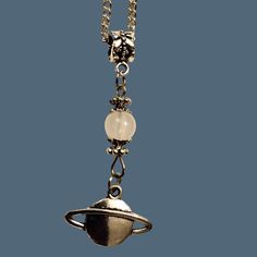 This Planet Saturn Charm Necklace Is A Unique Piece Of Space-Themed Jewelry. It Features A 26-Inch Silver Metal Chain With A Beautiful Saturn Charm, Perfect For Astronomy Enthusiasts. Silver Metal Chain (26 Inches) Planet Saturn Charm Space-Themed Design Condition: New With Tags Ships Same Or Next Day Saturn Charm, Astronomy Jewelry, Saturn Planet, Planet Saturn, Room Stuff, Phone Charms, Space Theme, Themed Jewelry, Phone Charm