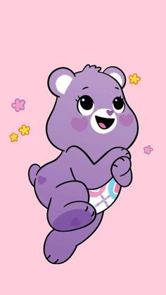 a purple teddy bear sitting on top of a pink background