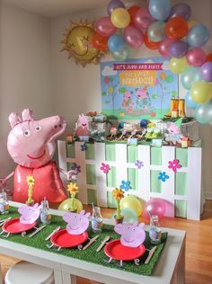 peppa pig birthday party with balloons and decorations