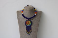 African beaded necklaces for women, Zulu necklace, Beaded women jewelry, Pendant necklace, Christmas gift for her, Moms gift, Boho necklace An elegant necklace that can compliments any outfit. Handmade in Kenya using fine beads. Color: dark blue Necklace length: 9 inches 3-5 days delivery via DHL Express.  Pay shipping fee for the first item only and additional items ship for FREE. To view more items in our shop, kindly click here:  nkoroicrafts.etsy.com Beaded Necklaces With Dangling Pendant Beads As A Gift, Dangling Beads Pendant Necklace Gift, Gift Beaded Necklace With Dangling Pendant, Gift Beaded Necklace With Large Beads And Round Pendant, Zulu Necklace, Dichroic Jewelry, Fabric Necklace, Necklace Patterns, Beaded Pendant Necklace