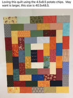 an image of a quilt made with many different colors and patterns on it's side