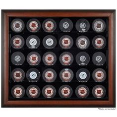 an ice hockey puck display case with glass front and wooden frame for 12 pucks