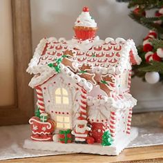 a gingerbread house is decorated for christmas